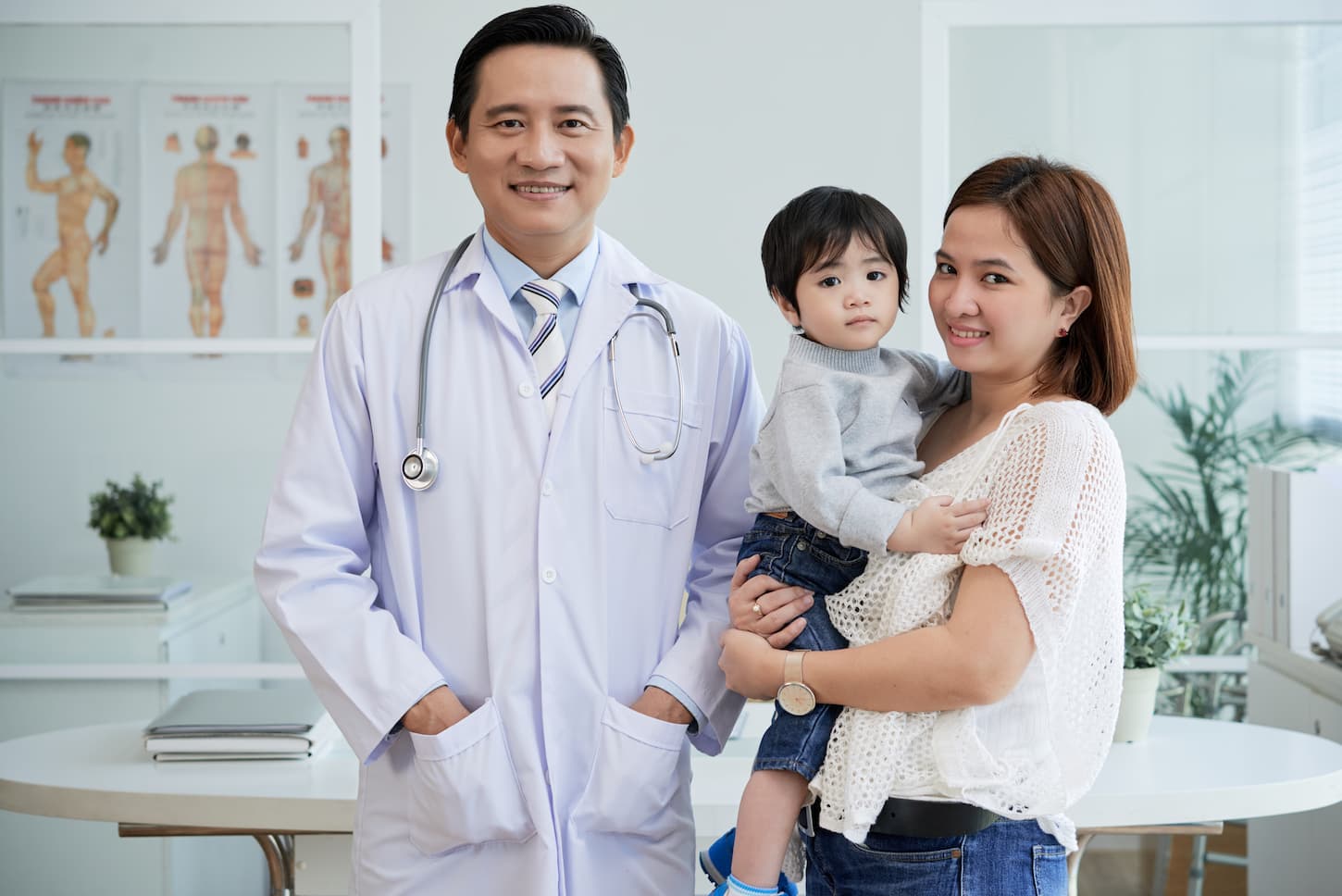 An image of a mother and son attending a professional pediatrician.